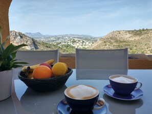 Morning coffee with breathtaking views. Now with new table.