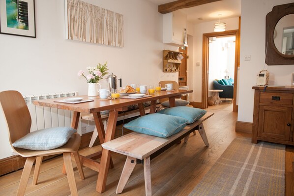 Dining room is open plan with the hallway and kitchen.