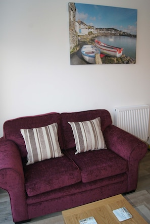 Lounge, with a picture of the beautiful Mousehole