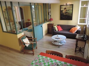 view from the kitchen, on the lounge and the room