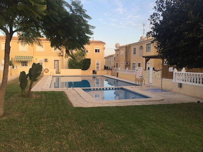 Stunning 2 Bedroom Apartment Backing Onto Pool With Great Outside Space