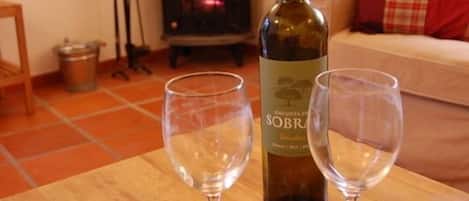 Enjoy a glass of wine in the warmth of the stove