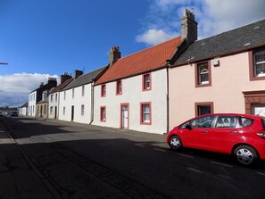 My cottage is the white one with red windows