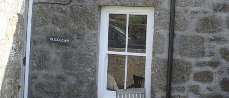 A traditional cornish cottage, with outside patio area