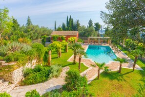 Paleopetres - La Chataîgne - gardens and pool (poolhouse is white now)