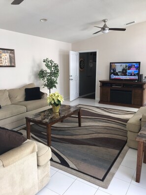 Front room with door leading to games room