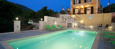 VIEW OF THE PRIVATE POOL AT THE EVENING