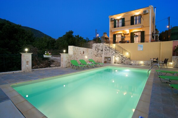 VIEW OF THE PRIVATE POOL AT THE EVENING