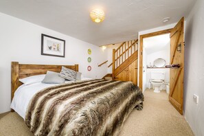 Master bedroom win ensuite toilet and King size bed