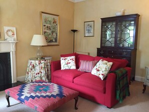 Sitting room and dining room overlooking private patio garden