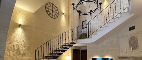 The lounge area and magnificent staircase.