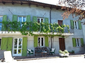 RHS of rental house with front door  and store room, above the 3rd bedroom.