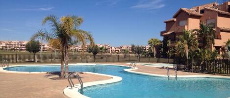 Our lovely apartment overlooking the shared pool