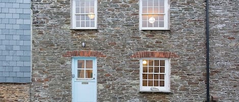 Park directly in front of the cottage on this quiet street