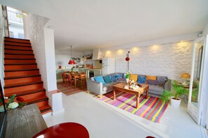Split in 3 levels, stairs go from street level living room/kitchen & bedrooms