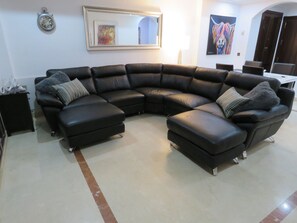 Lounge area with large leather sofa