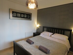 Bedroom 1 with en-suite and air conditioning 