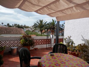 Private terrace with sun canopy