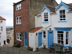 Kildale Cottage with the seafront just to the left of the property.