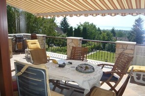 Terrace with lake, one kilometre away. Bus service.
