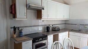 Kitchen. All Modern Appliances. Large Flat Screen TV.