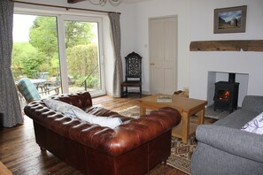 The living/dining room with gorgeous views of the garden