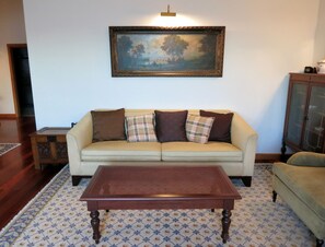 Comfortable living room decorated with genuine classic style furniture.