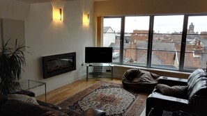 Lovely spacious lounge with great rooftop views!