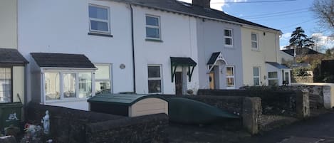 Riverbank is the 1st white cottage on the left, parking for one car on driveway