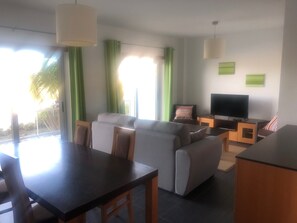 Living / dining room with new sofa bed.