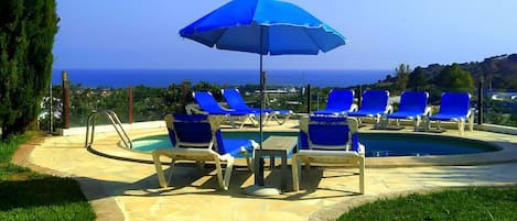 View from house to pool and sea