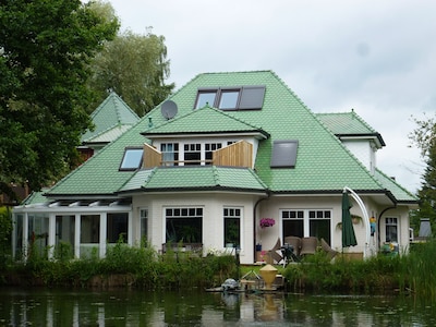 Modern apartment with a wonderful view of the pond