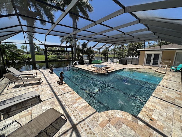 Beautifully L-shaped pool and jacuzzi with waterfall-solar and electric heating