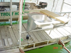 Fish cleaning on the dock.