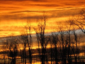 Evening sunset from farmhouse window