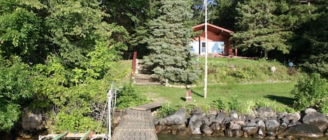 Welcome to Loon Nest- view of the cabin from the dock and shore station.