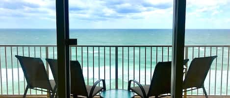 Sit back, relax & enjoy spectacular Gulf views in comfort of living area/balcony