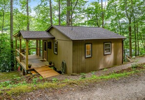 Private road view of the cabin.  The porch  overlooks the pond and our house.  