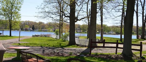 Front yard view by the fire pit of beautiful vineyard lake