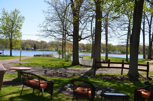 Front yard view by the fire pit of beautiful vineyard lake