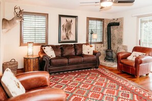 Unwind in the living room embraced by Hill Country charm.