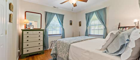 Master bedroom-queen-sized bed with memory foam topper, dresser and closet.