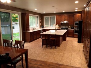 Kitchen Includes dishwasher, double oven, Range, convection oven, refrigerator
