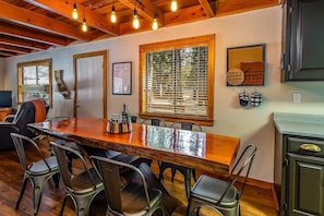 Gorgeous slab with a raw edge. Dining table seats 8.