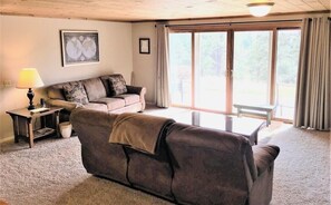Relax in the Living Room with a view.