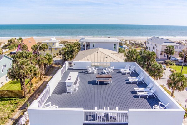 Highly sought after "Upper Deck" at Sol Mate.  Never ending views, ample seating/lounging and a bar with running water and a mini fridge. It is the place to be!