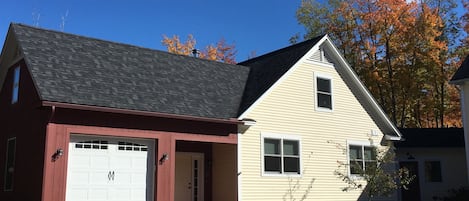 Front of house with attached one car garage
(notice pickle ball court lines!)
