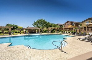 Community pool. Enjoy a swim or soak in the hot tub. It has has a bbq area.