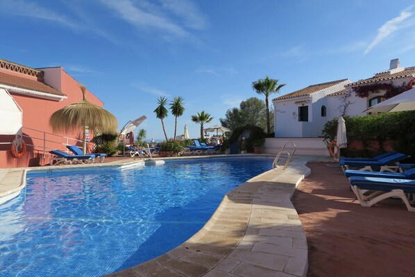 Pool - early evening. Pueblo Los Arcos 4 Nerja is on the right border of imag