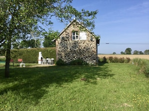 Farmland and quiet lanes surround the property